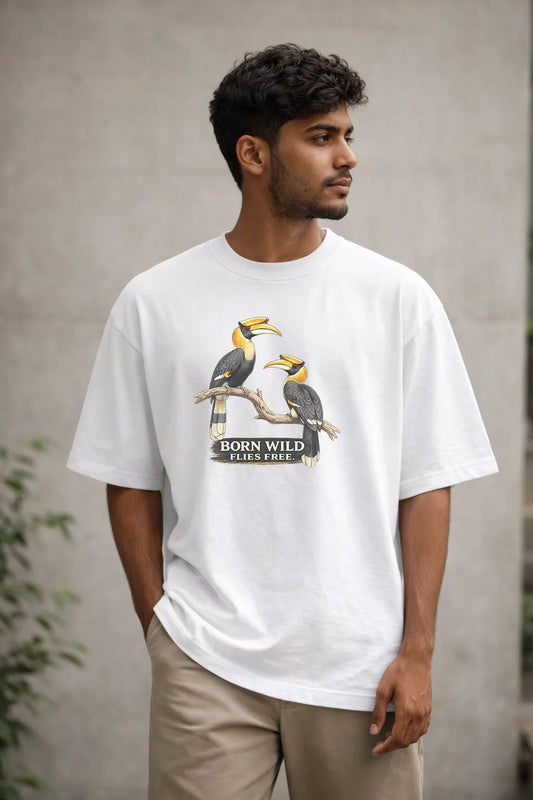 Man wearing a white t-shirt with a bird graphic and text, standing against a neutral background.